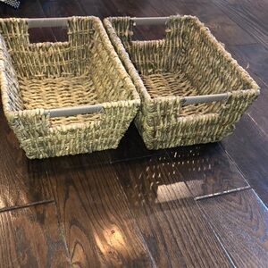 Set of two straw wicker baskets with handles